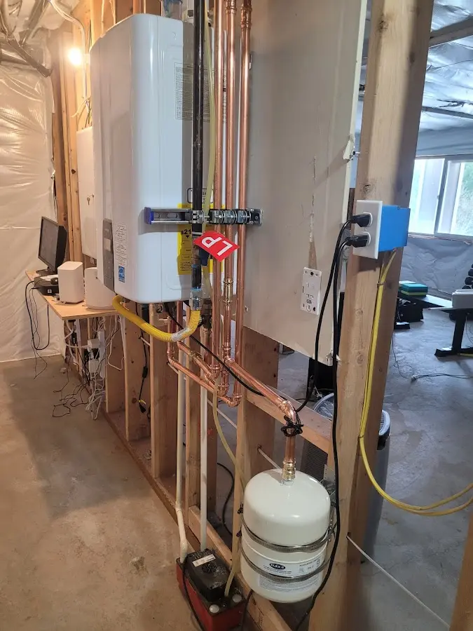 Licensed plumber repairing a kitchen sink in Winfield